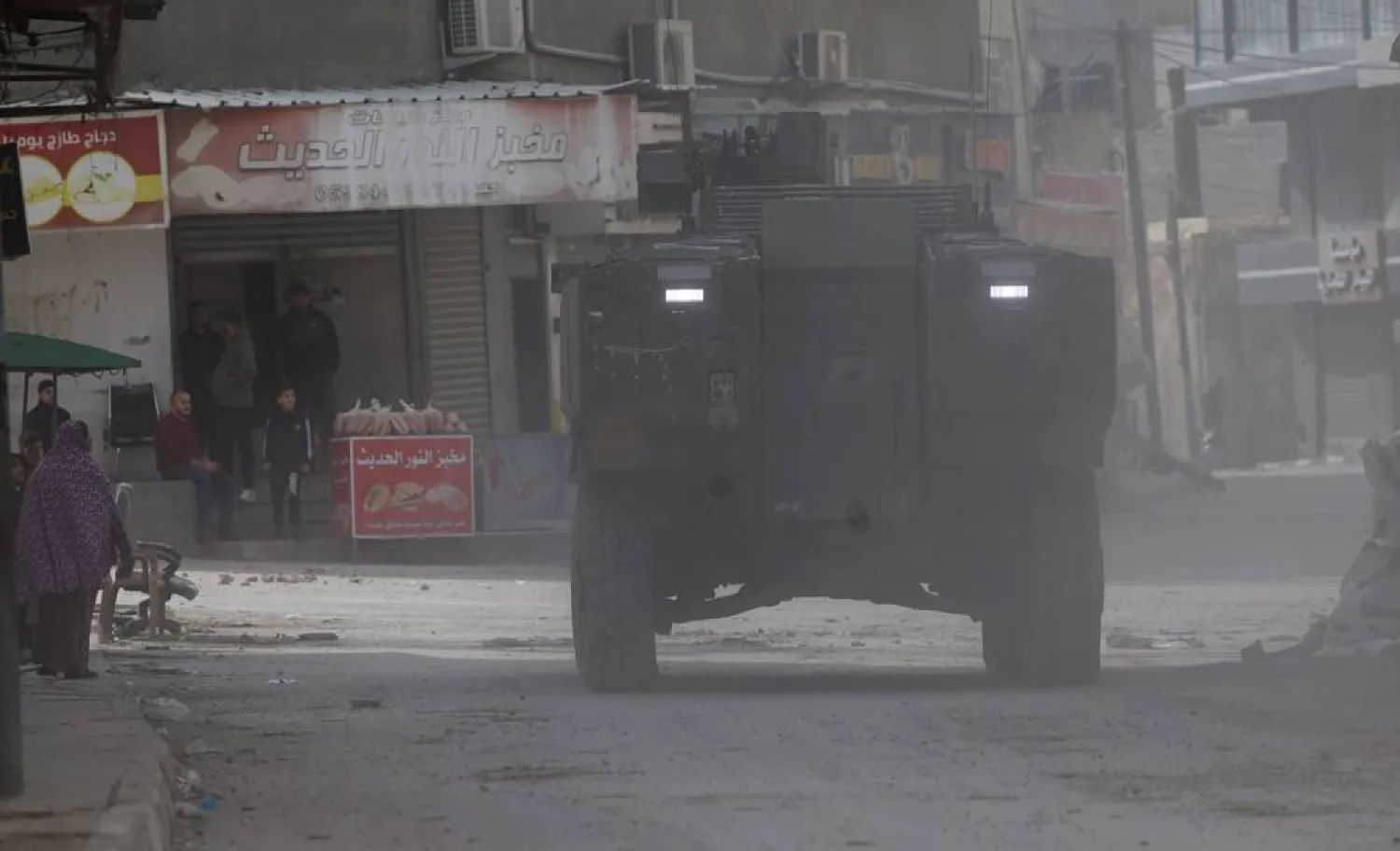 An Israeli military vehicle is seen during a military operation in the West Bank city of Jenin, 04 March 2025. (EPA)