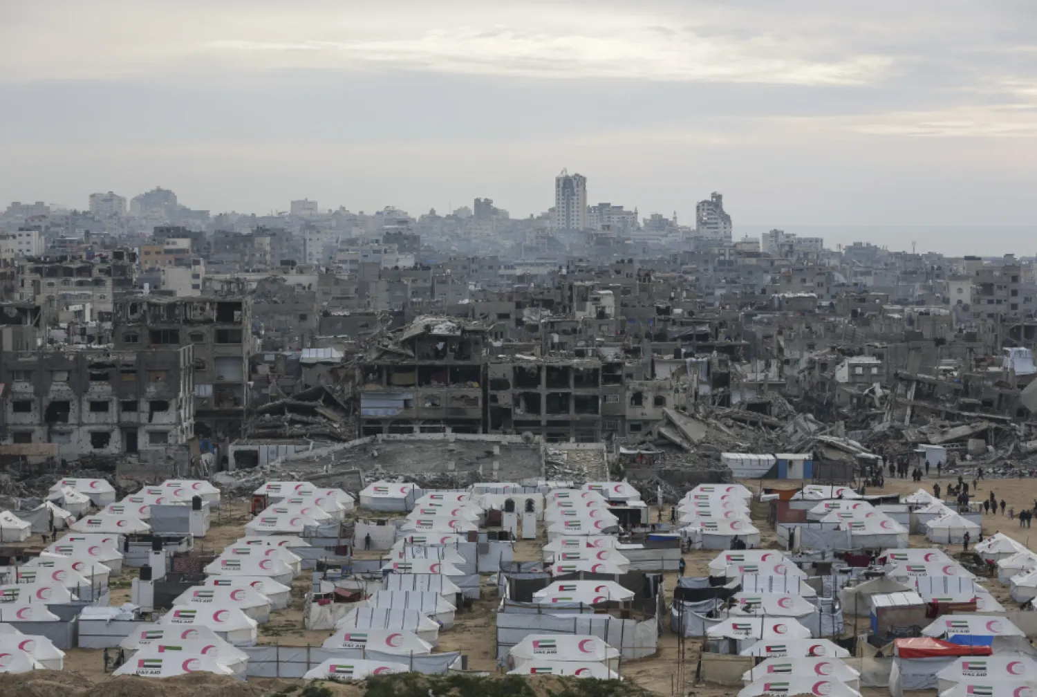 A tent camp for displaced Palestinians is set up amid destroyed buildings in the west of Al-Shati camp, west of Gaza City, on Monday, March 3, 2025. (AP Photo/Jehad Alshrafi)

