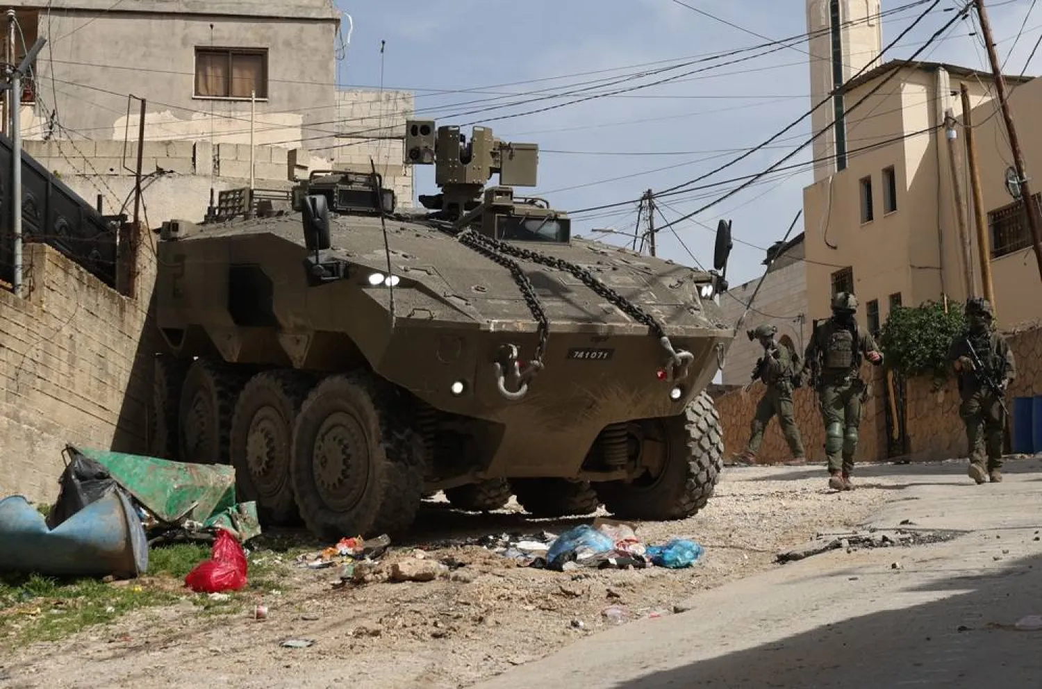 An Israeli military vehicle is seen during a military operation in the West Bank city of Jenin, 04 March 2025. (EPA)