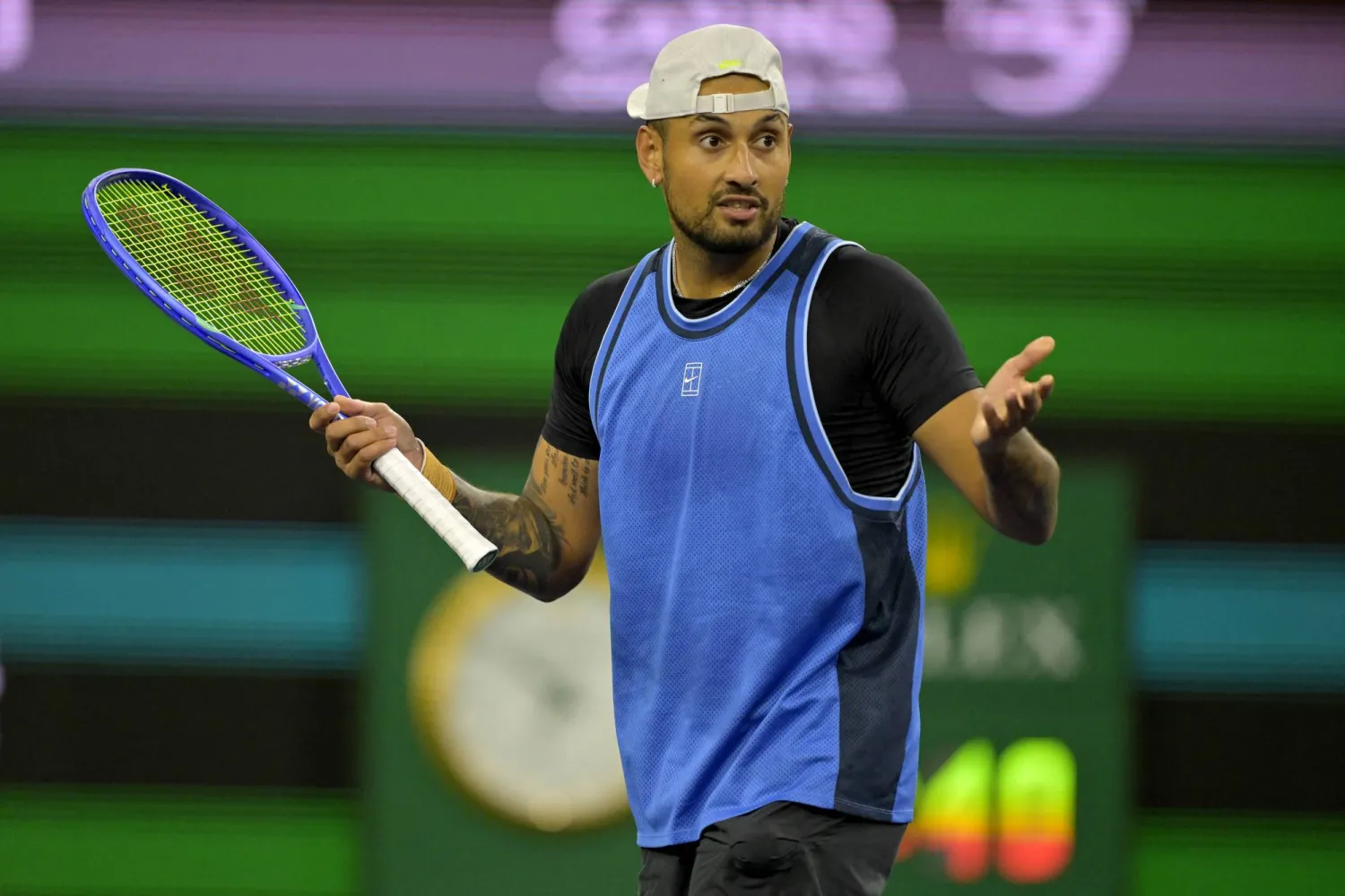 Mar 6, 2025; Indian Wells, CA, USA;  Nick Kyrgios (AUS) reacts after a point against Botic Van De Zandschulp (not pictured) during his first round match of the BNP Paribas Open at the Indian Well Tennis Garden. Mandatory Credit: Jayne Kamin-Oncea-Imagn Images