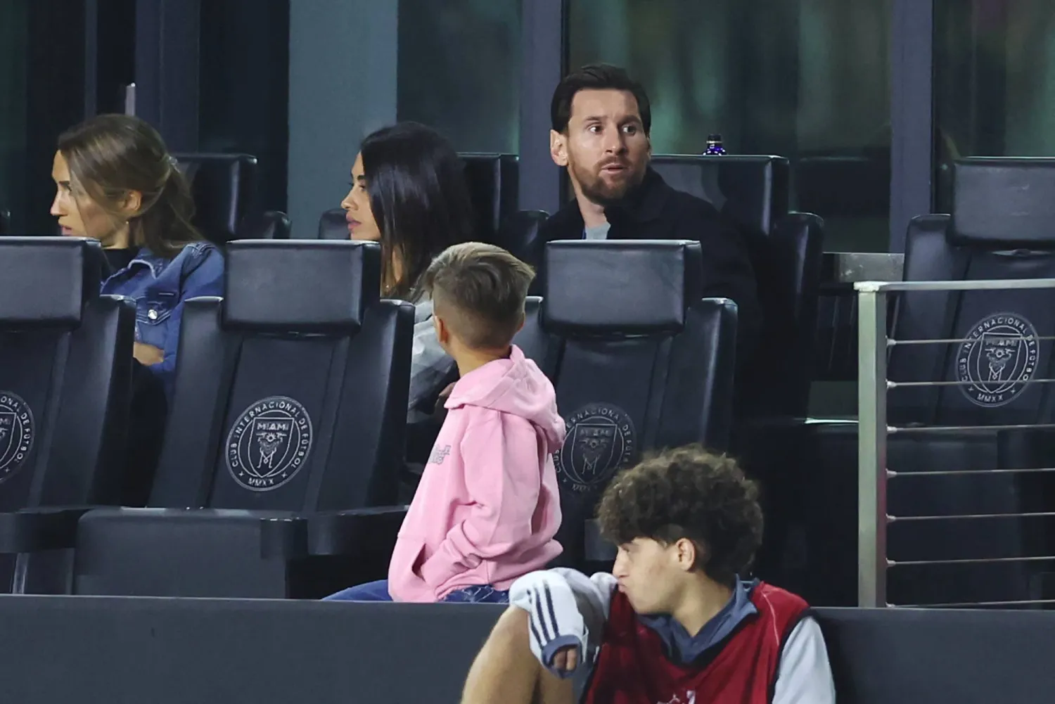 FORT LAUDERDALE, FLORIDA - MARCH 06: Lionel Messi #10 of Inter Miami CF alongside Antonela Roccuzzo observe from the sidelines during the 2025 Concacaf Champions Cup Round of 16 First Leg match between Inter Miami CF and Cavalier SC at Chase Stadium on March 06, 2025 in Fort Lauderdale, Florida. Megan Briggs/Getty Images/AFP 