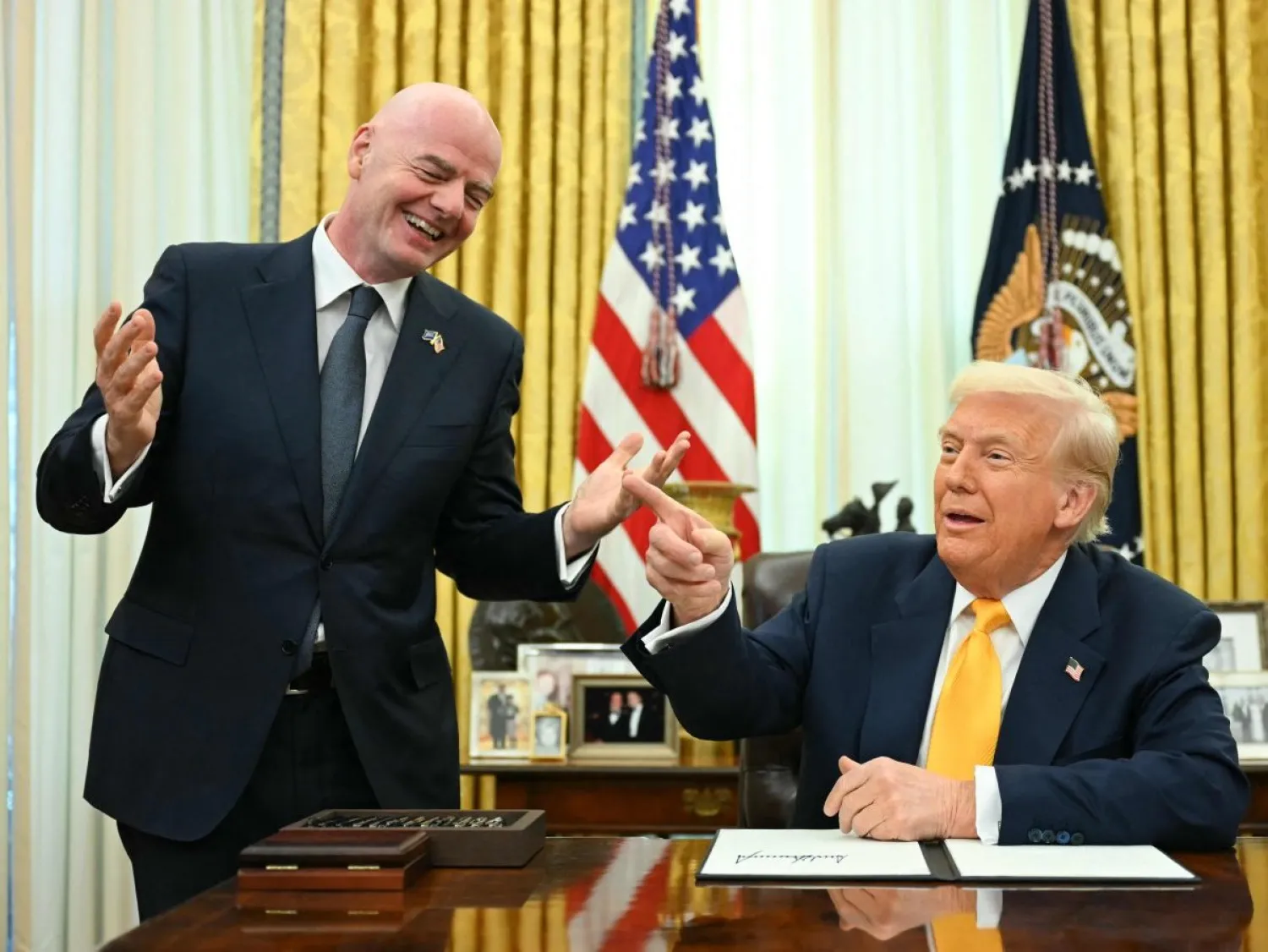 ترمب ورئيس الاتحاد الدولي لكرة القدم جياني إنفانتينو في البيت الأبيض 7 مارس 2025 (أ.ف.ب)