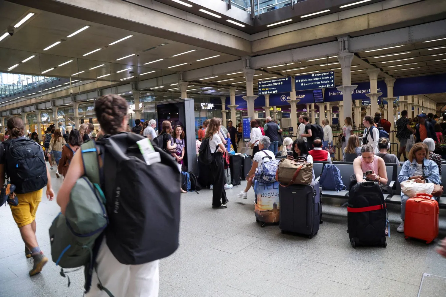 FILE PHOTO: Passengers wait at the Eurostar terminal in St. Pancras International Station, in London, Britain, July 26, 2024. REUTERS/Leila Dougan/File Photo
