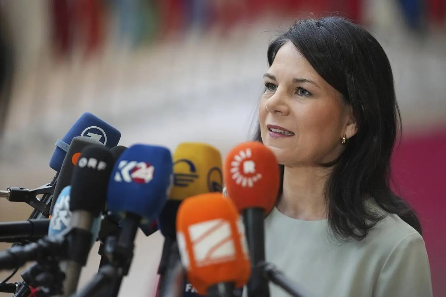 Germany's Foreign Minister Annalena Baerbock speaks with the media as she arrives for a meeting of EU foreign ministers at the European Council building in Brussels, Monday, March 17, 2025. (AP)