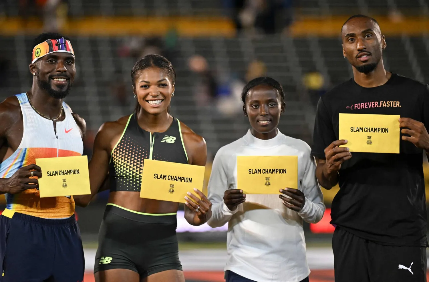 احتل هدسون سميث المركز الثاني في الترتيب بعد سباق 400 متر (أ.ف.ب)