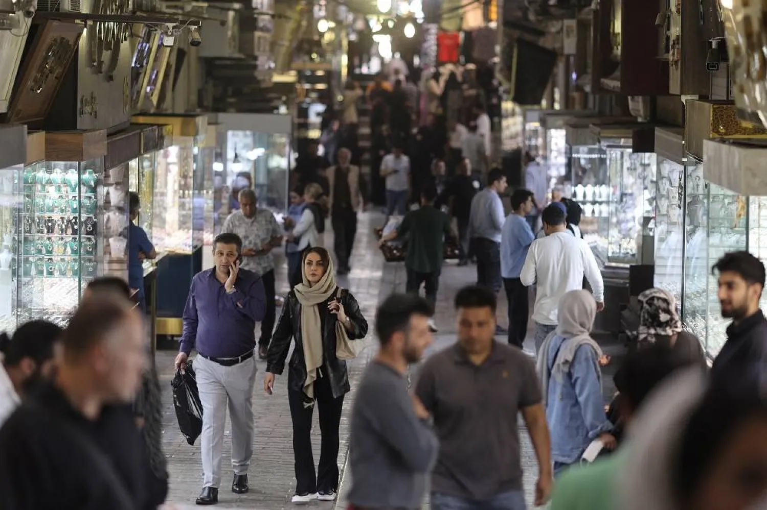 People walk at the Tehran Bazaar in Tehran, Iran, April 14, 2025. Majid Asgaripour/WANA (West Asia News Agency) via Reuters
