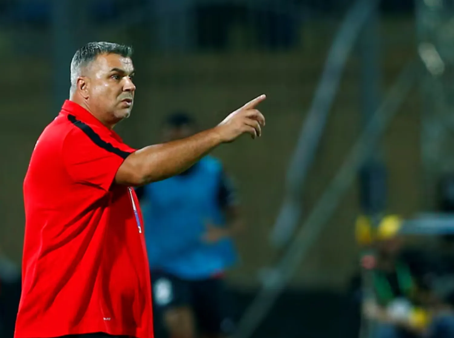 Football Soccer - Al Ahli v Al Jazira - Arabian Gulf Super Cup - 30 June Air Defense Stadium, Cairo, Egypt - 13/09/16 - Romanian head coach Cosmin Olaroiu of Al Ahli gestures during the game. REUTERS/Amr Abdallah Dalsh/File Photo