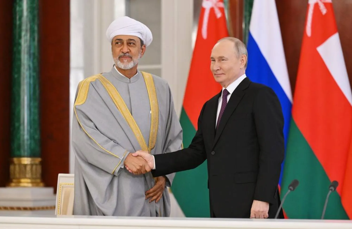 Sultan of Oman Haitham bin Tariq al-Said (L) and Russian President Vladimir Putin shake hands during a signing ceremony following their meeting at the Kremlin in Moscow, Russia, 22 April 2025. (EPA/Kristina Kormilitsyna / Sputnik / Kremlin) 