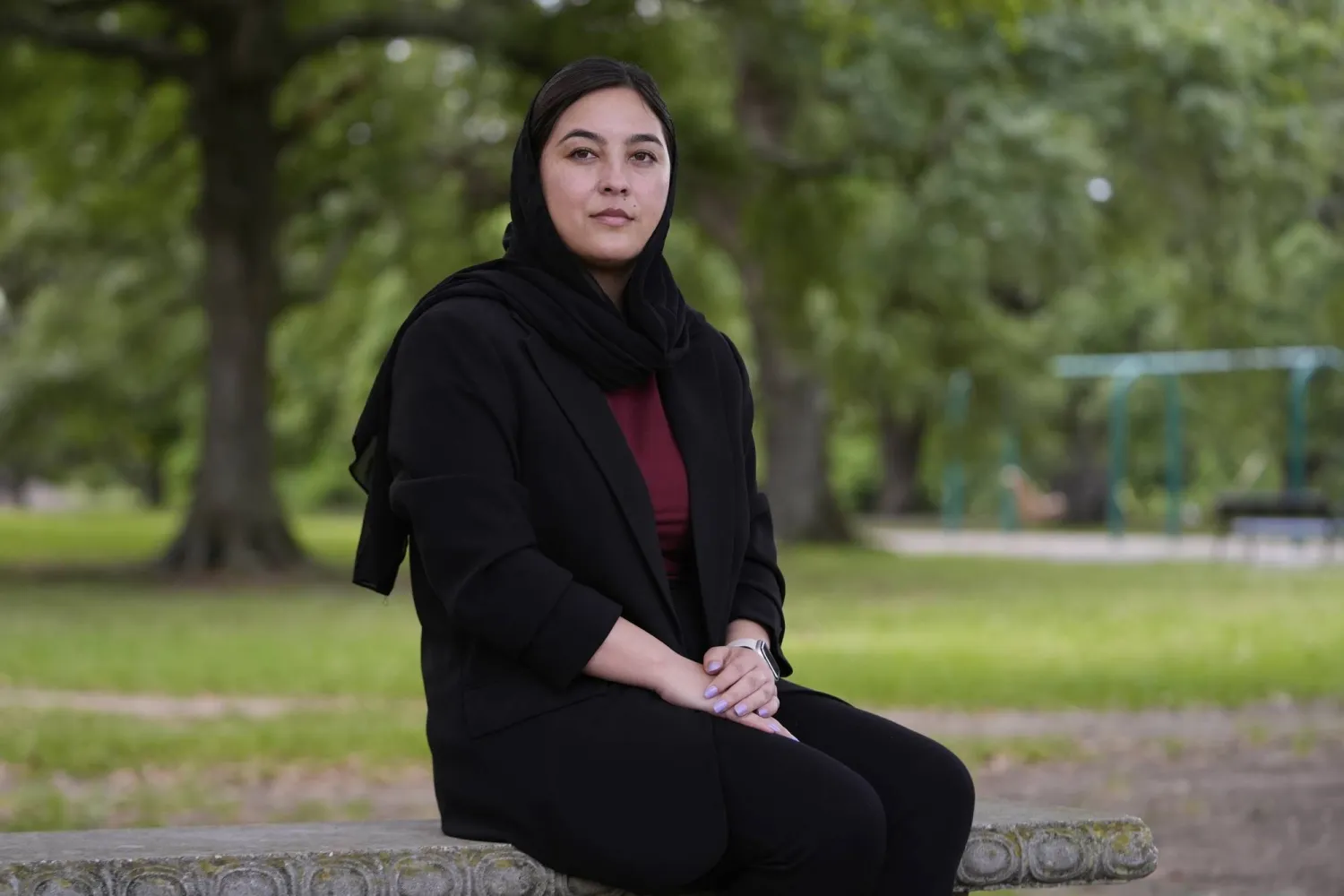 نجينا خليلي في صورة سابقة لها بانتظار انتهاء أوراق الهجرة إلى أميركا (أ.ب)