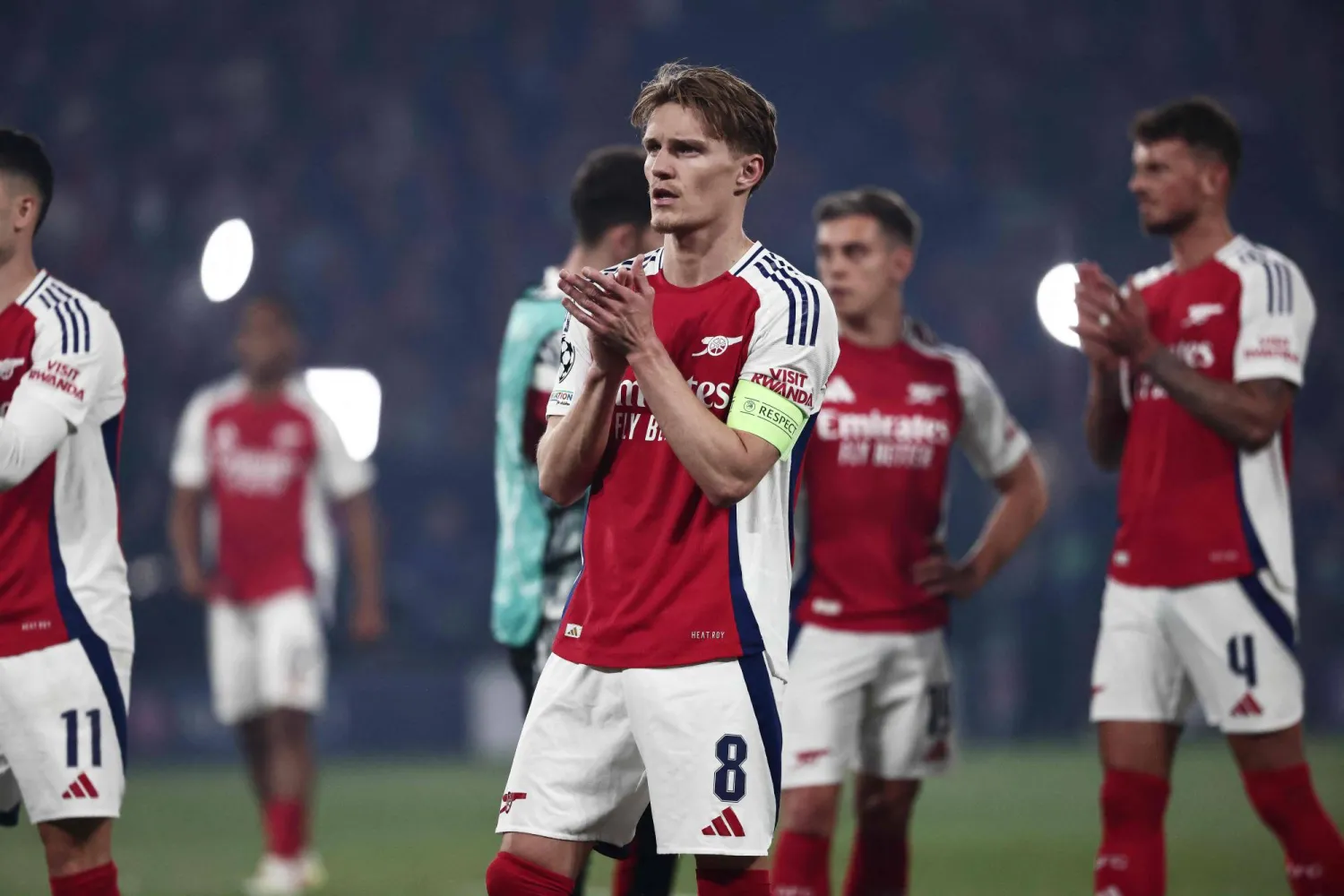 آرسنال ضمن المشاركة في دوري الأبطال مع البطل ليفربول (أ.ف.ب)