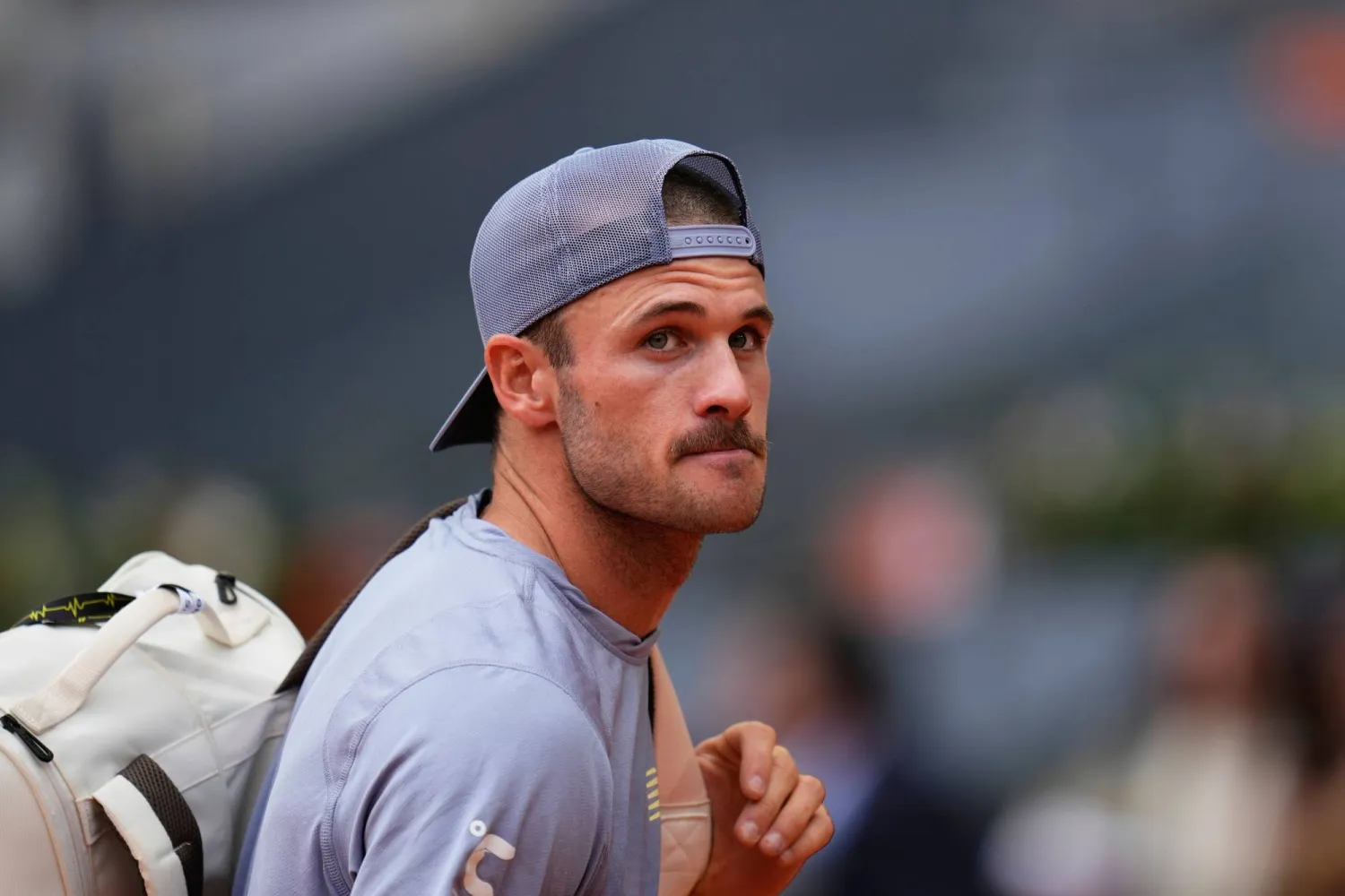 الأميركي تومي باول يتألق في روما (أ.ب)