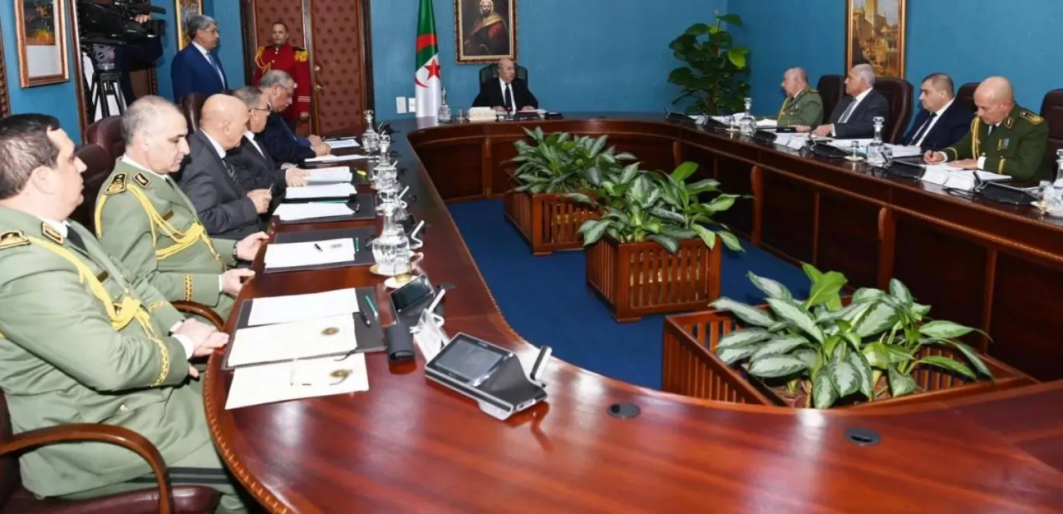 The Algerian president is seen during a meeting with top civilian and military officials in April (Presidency)