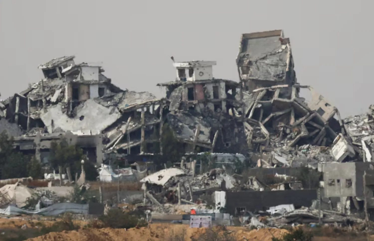A general view of destruction in North Gaza, as seen from the Israeli side of the Israel-Gaza border, May 17, 2025. REUTERS/Amir Cohen 