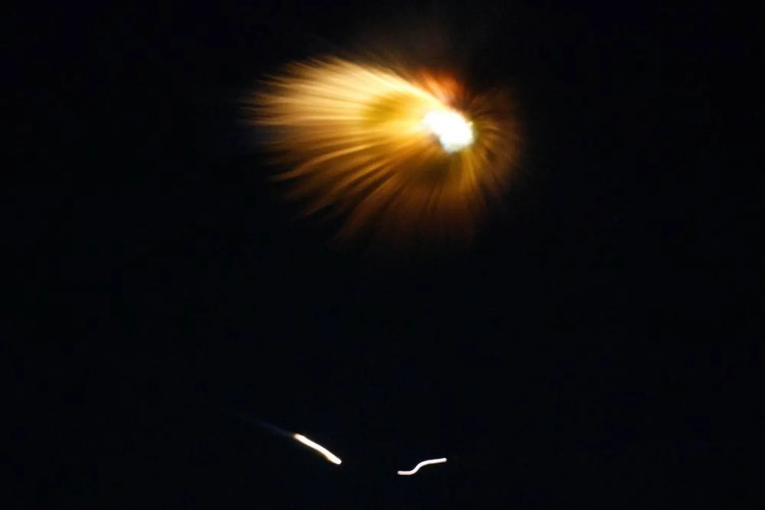 The interception of a missile, that the Israeli military said to have been fired from Yemen, is seen from the city of Ashkelon, Israel, May 18, 2025. (Reuters)