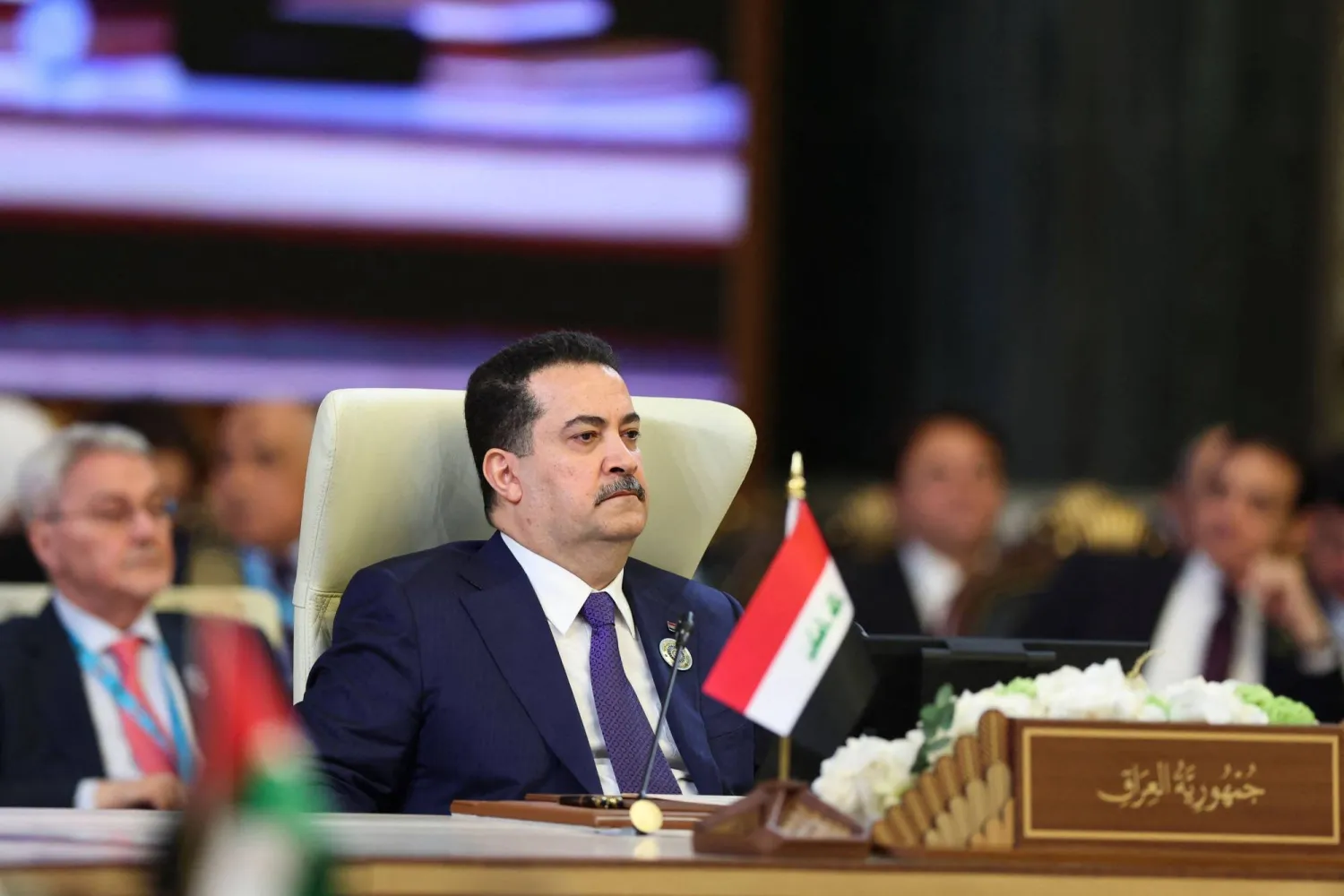 Iraq's Prime Minister Mohammed Shia al-Sudani attends the 34th Arab League summit in Baghdad on May 17, 2025. (Photo by THAIER AL-SUDANI / POOL / AFP)