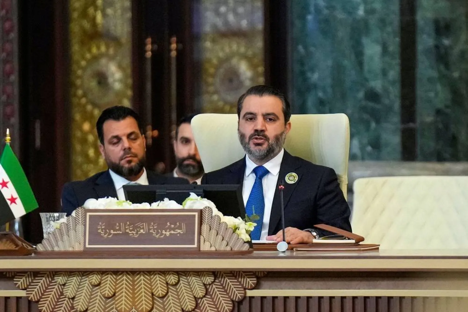 Syrian Foreign Minister Asaad al-Shaibani addresses the 34th Arab League summit in Baghdad on May 17, 2025. (AFP)
