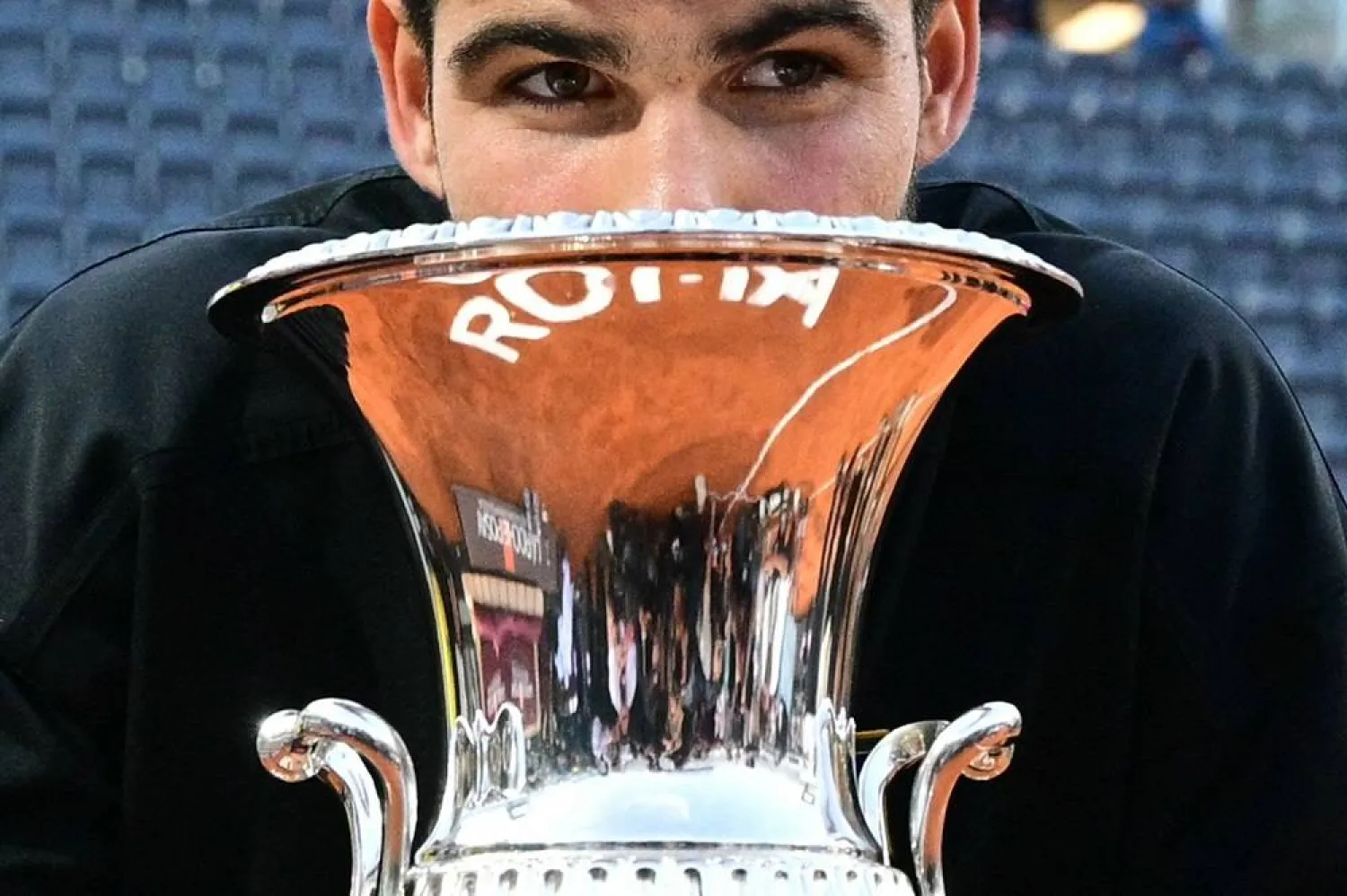 Spain's Carlos Alcaraz poses with his winner trophy at the end of his men's singles final match against Italy's Jannik Sinner for the ATP Rome Open tennis tournament at Foro Italico in Rome on May 18, 2025. (AFP)
