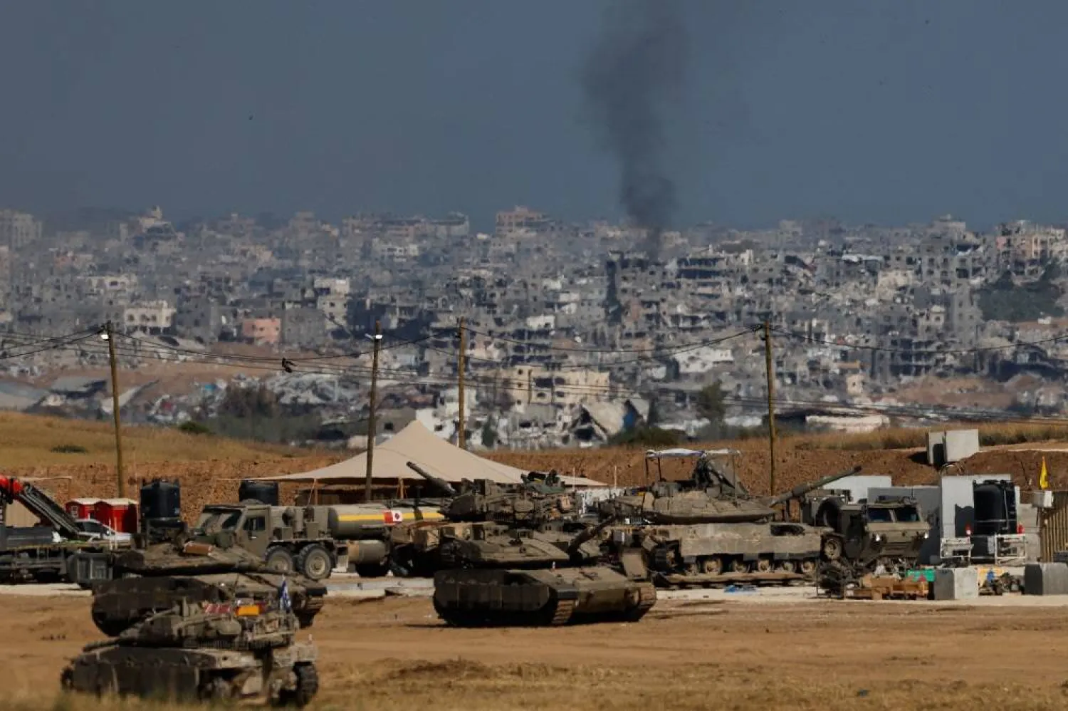 Military vehicles stand near the border with Gaza, in Israel, May 20, 2025. (Reuters)