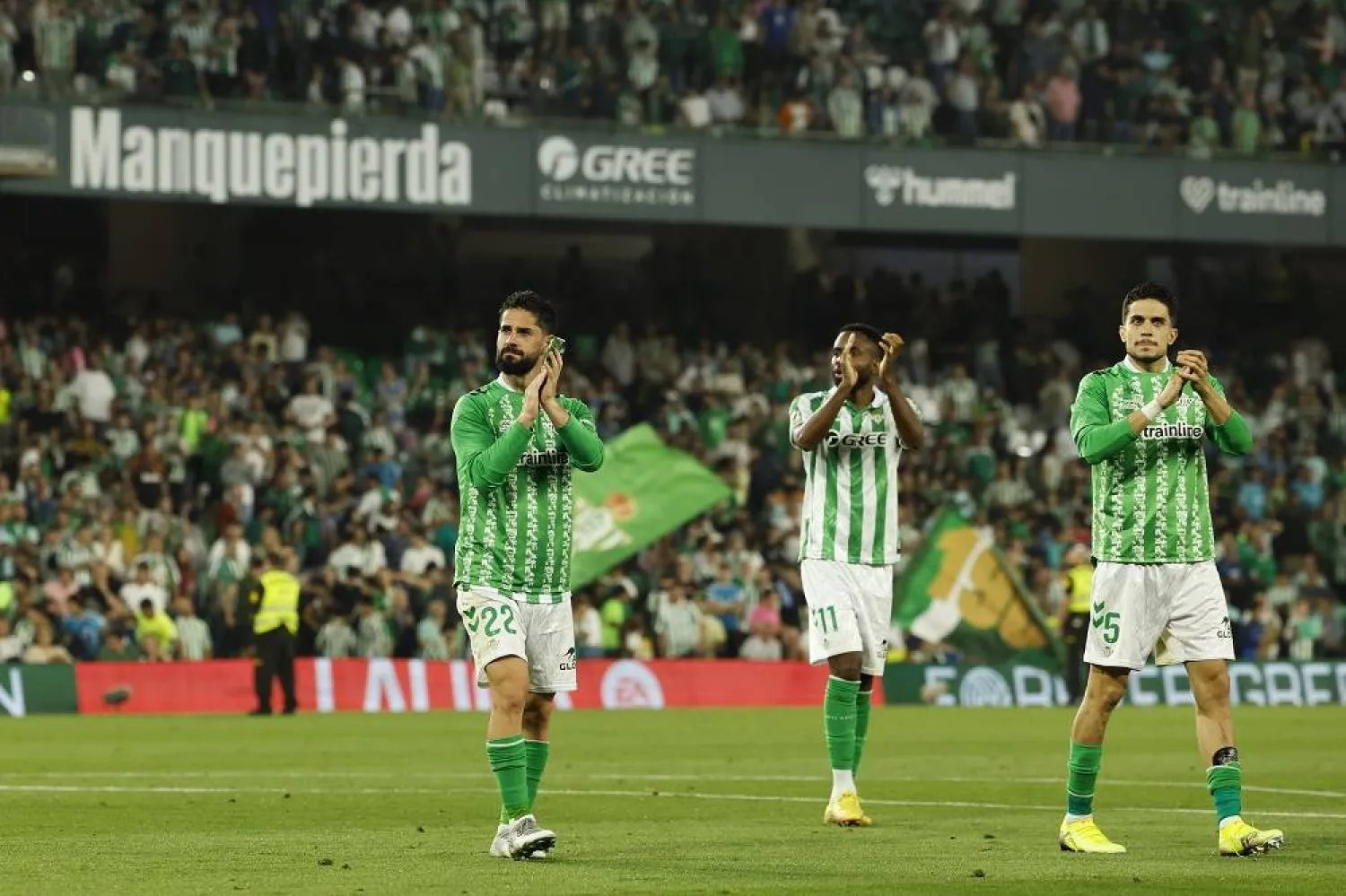 Betis players (L-R) Isco Alarcon, Cedric Bakambu and Marc Bartra greet their supporters after the Spanish LaLiga soccer match between Real Betis and Valencia CF, in Seville, Spain, May 23, 2025. (EPA)