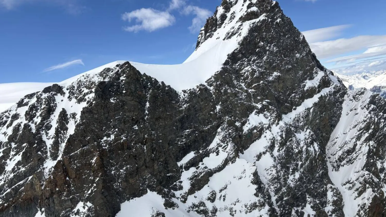 The Rimpfischhorn is a 4,199-meter (13,776-foot) mountain east of Zermatt, near the Italian border. HANDOUT / POLICE CANTONALE VALAISANNE/AFP

