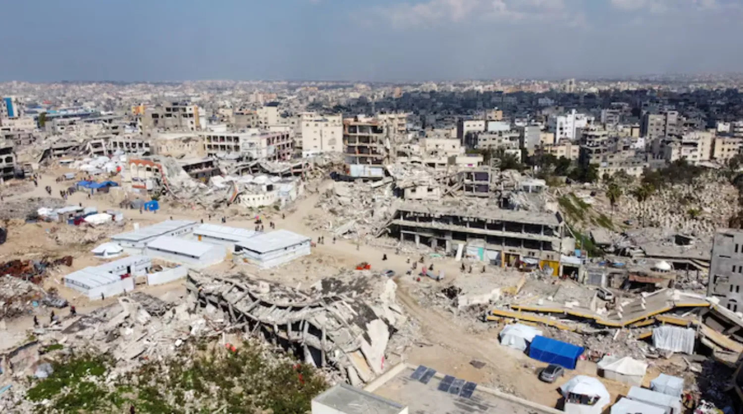 A drone view shows displaced Palestinians sheltering in tents set up near the rubble of buildings destroyed during the Israeli offensive, amid a ceasefire between Israel and Hamas, in Gaza City February 17, 2025. REUTERS/Dawoud Abu Alkas/File Photo