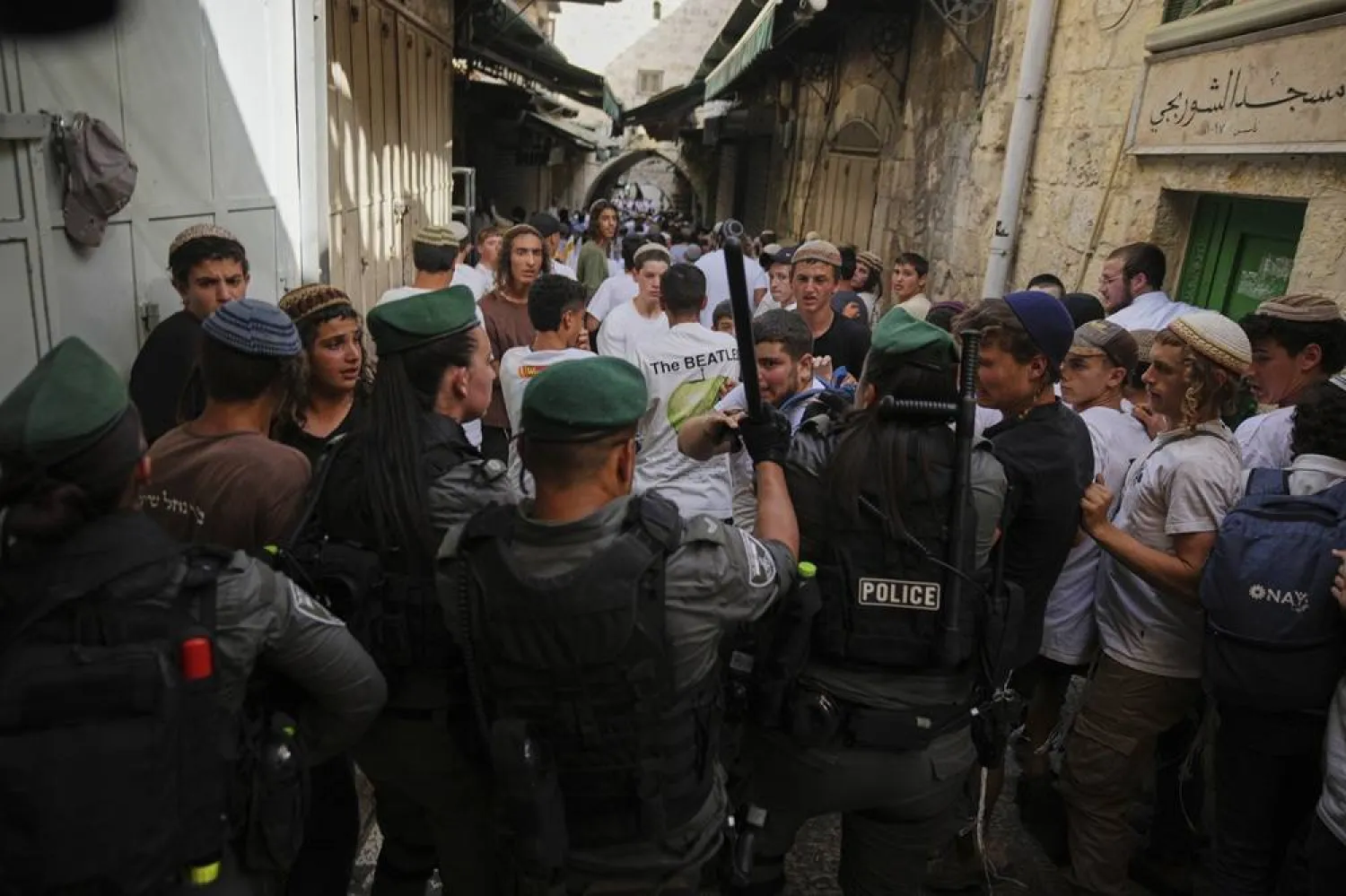  Israeli police scuffle with young Israelis marching through Jerusalem's Old City marking Jerusalem Day, an Israeli holiday marking the capture of east Jerusalem in the 1967 Middle East War, Monday, May 26, 2025. (AP) 