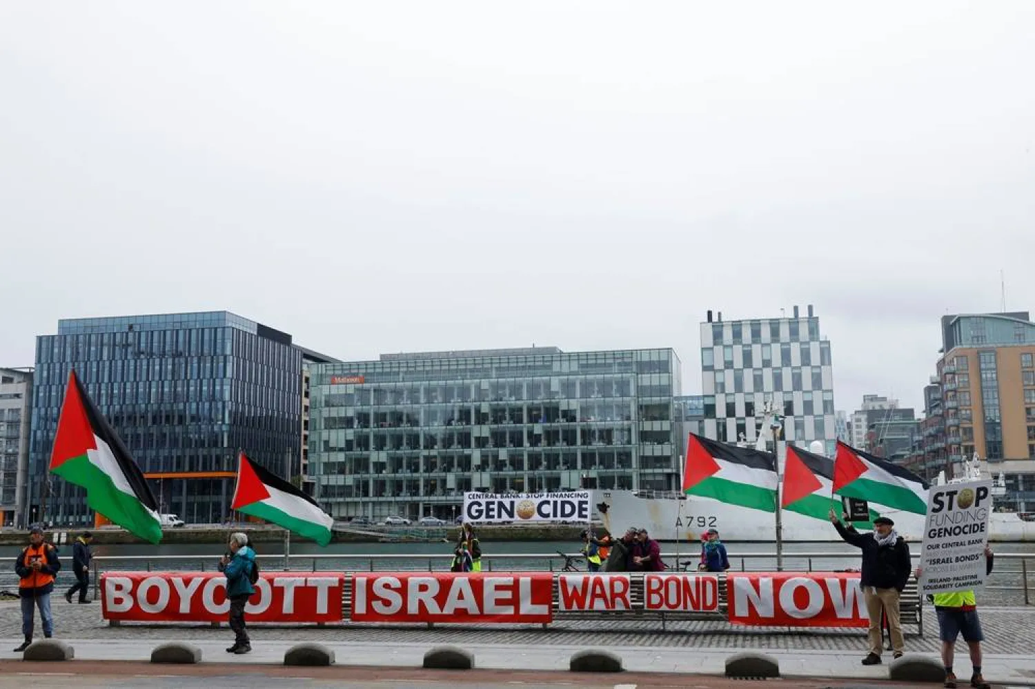 People in support of Palestinians demonstrate in front of the Central Bank of Ireland against the sale of Israeli war bonds throughout the EU, in Dublin, Ireland, May 27, 2025. (Reuters)