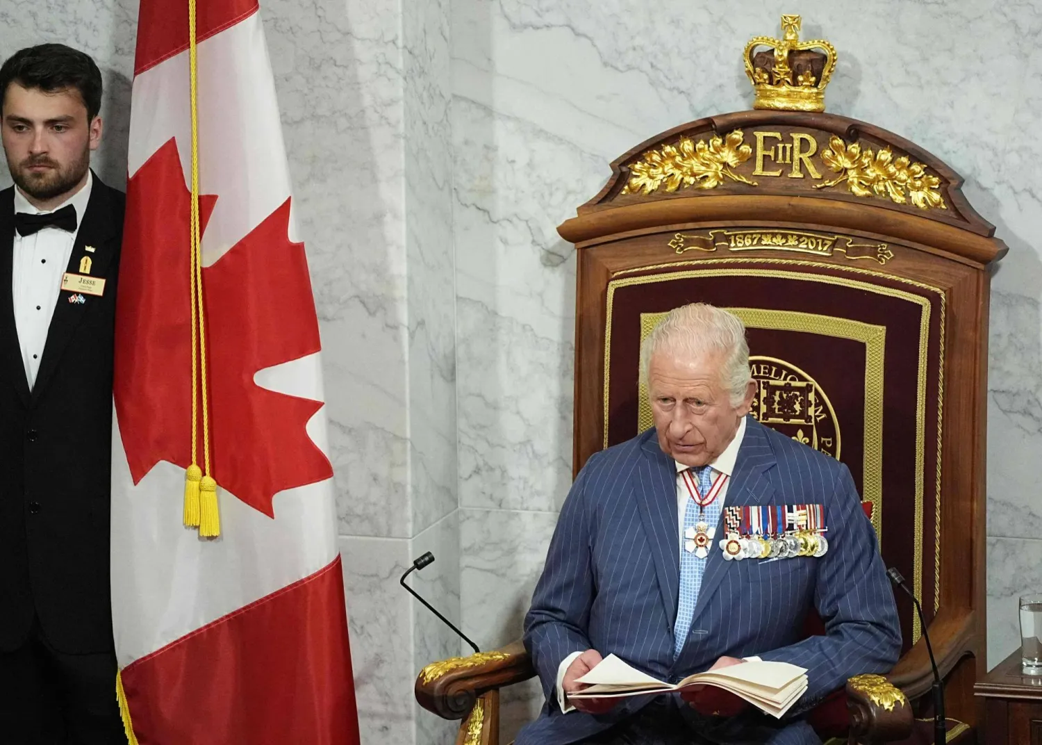 الملك البريطاني تشارلز يتحدث خلال مراسم افتتاح الدورة البرلمانية في أوتاوا (أ.ف.ب)