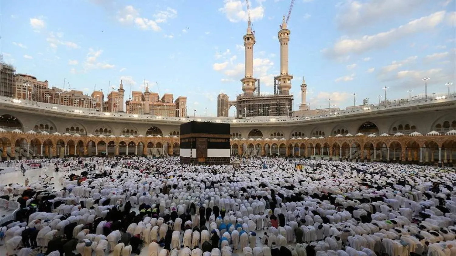 Muslims perform the Eid al-Adha morning prayer around the Kaaba at the Grand Mosque in Saudi Arabia's holy city of Makkah, on the first day of the holiday, on June 16, 2024. (AFP)