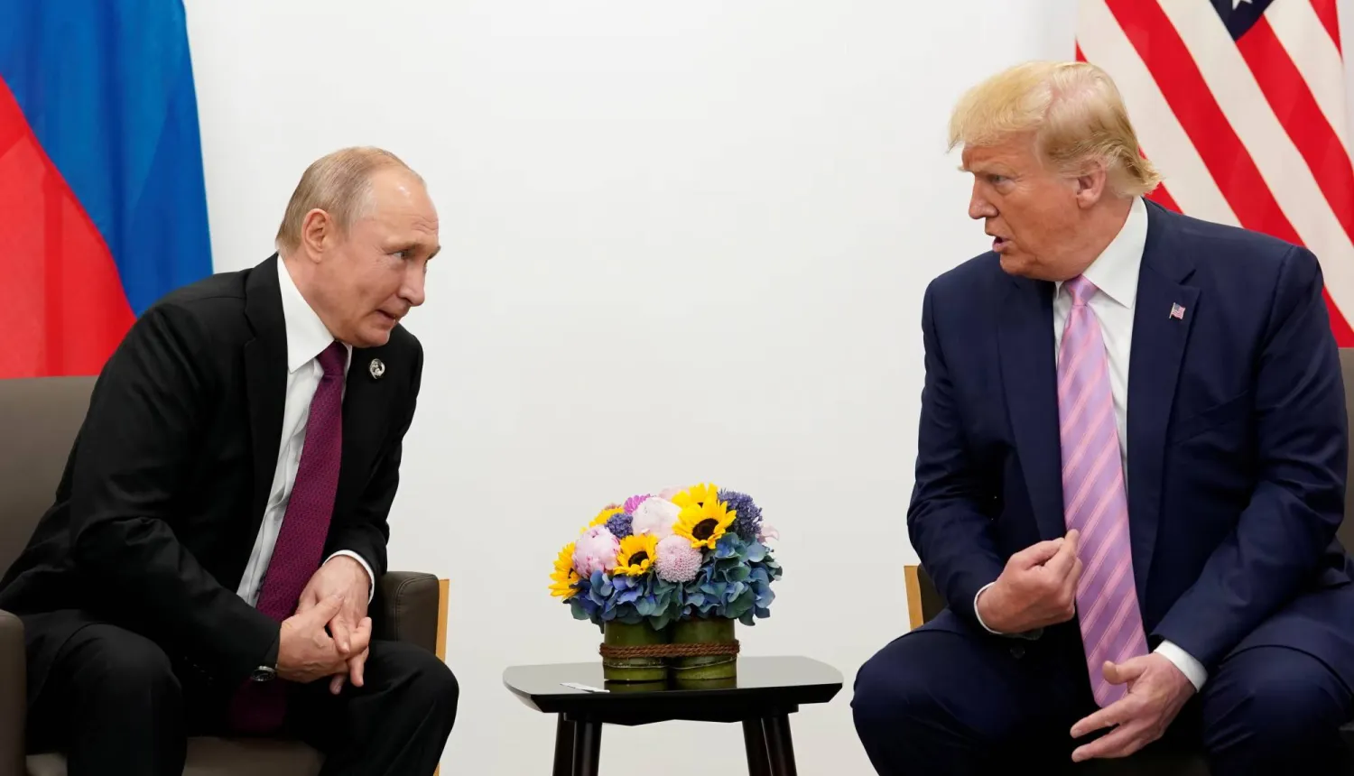 لقاء سابق بين الرئيس الأميركي دونالد ترمب والرئيس الروسي فلاديمير بوتين خلال قمة العشرين (أرشيفية-رويترز)