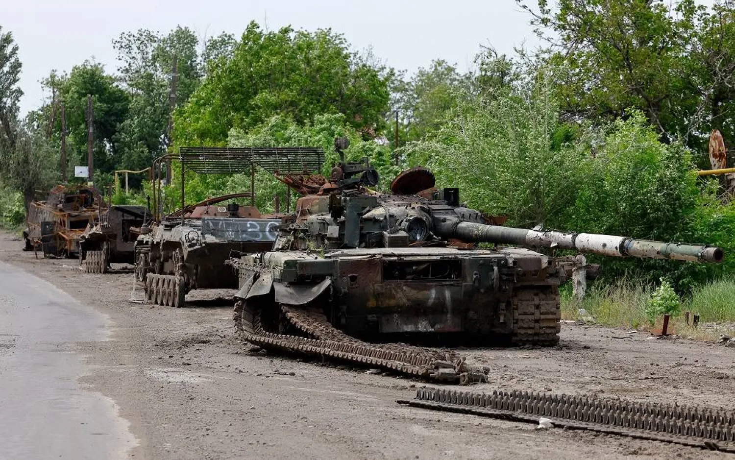 A view shows an abandoned column of armored vehicles, which was destroyed in the course of Russia-Ukraine conflict in the village of Mykilske (Nikolskoye) near Vuhledar (Ugledar) city in the Donetsk region, a Russian-controlled area of Ukraine, May 27, 2025. (Reuters)