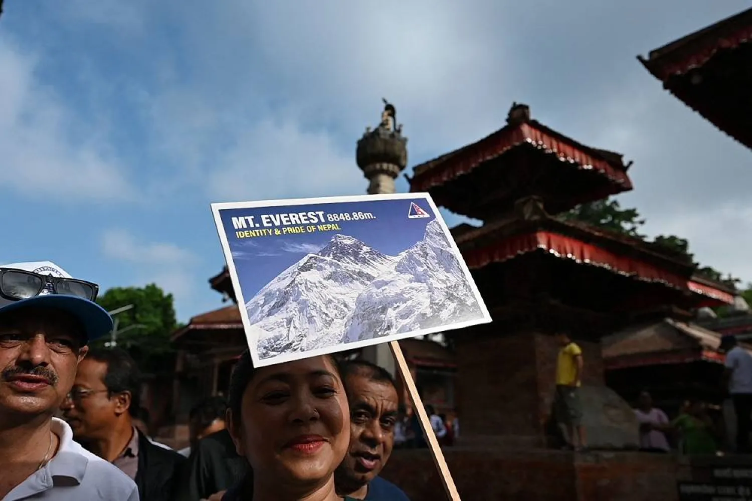 Nepali people take part in a procession to mark the 18th International Everest Day and the 72nd anniversary of the first ascent of Mount Everest in Kathmandu on May 29, 2025. (AFP)