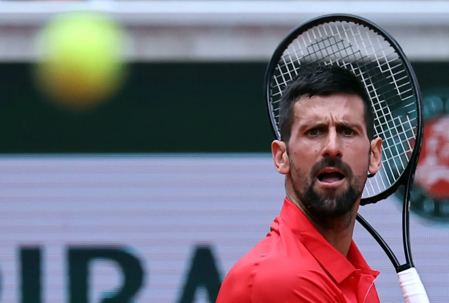 Novak Djokovic of Serbia in action during his Men's 2nd round match against Corentin Moutet of France at the French Open Grand Slam tennis tournament at Roland Garros in Paris, France, 29 May 2025. EPA/CHRISTOPHE PETIT TESSON