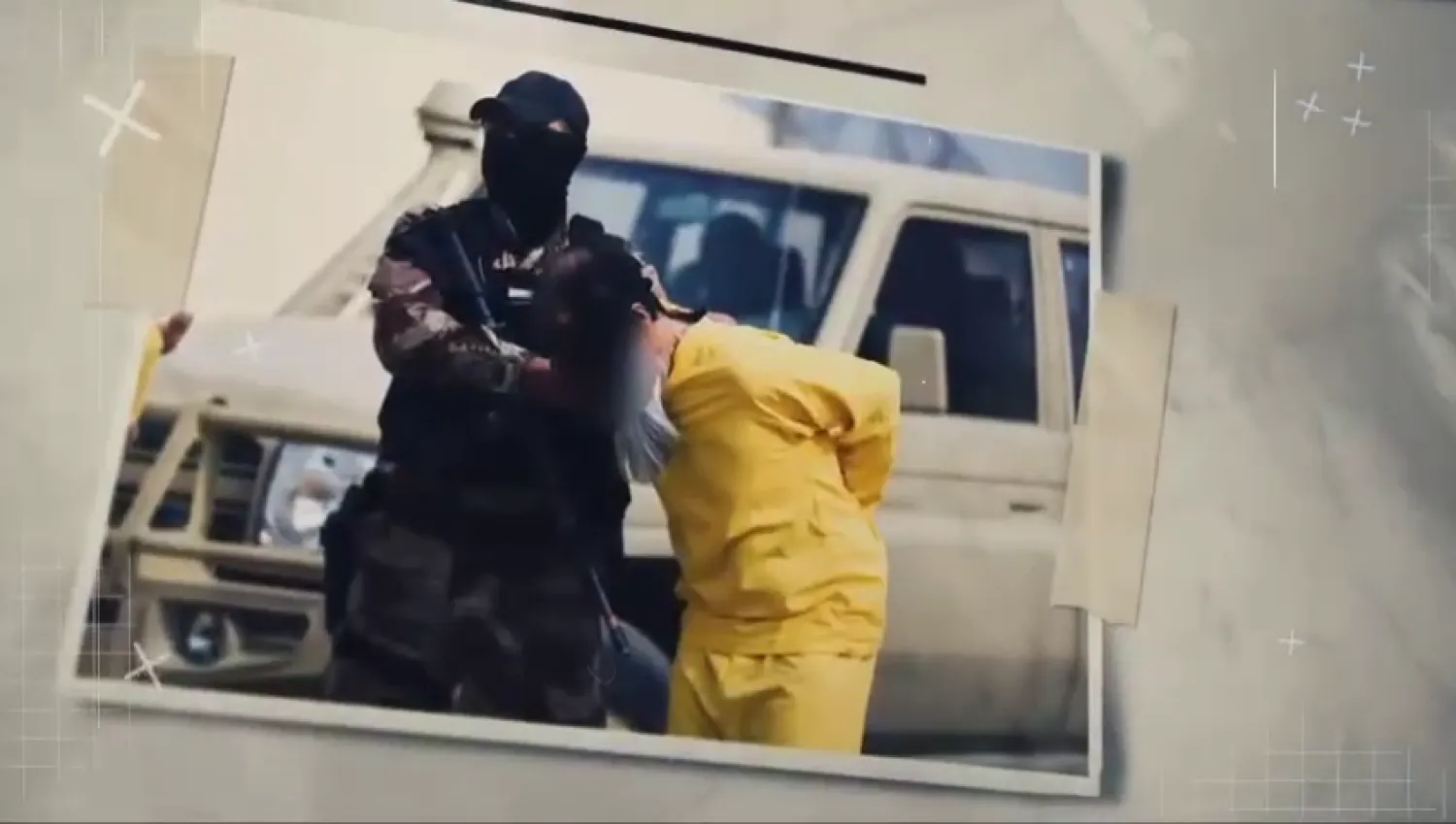 صورة تظهر القبض على أحد الأشخاص من شبكة «إجرامية» في العراق (لقطة من فيديو نشرته المخابرات العراقية)