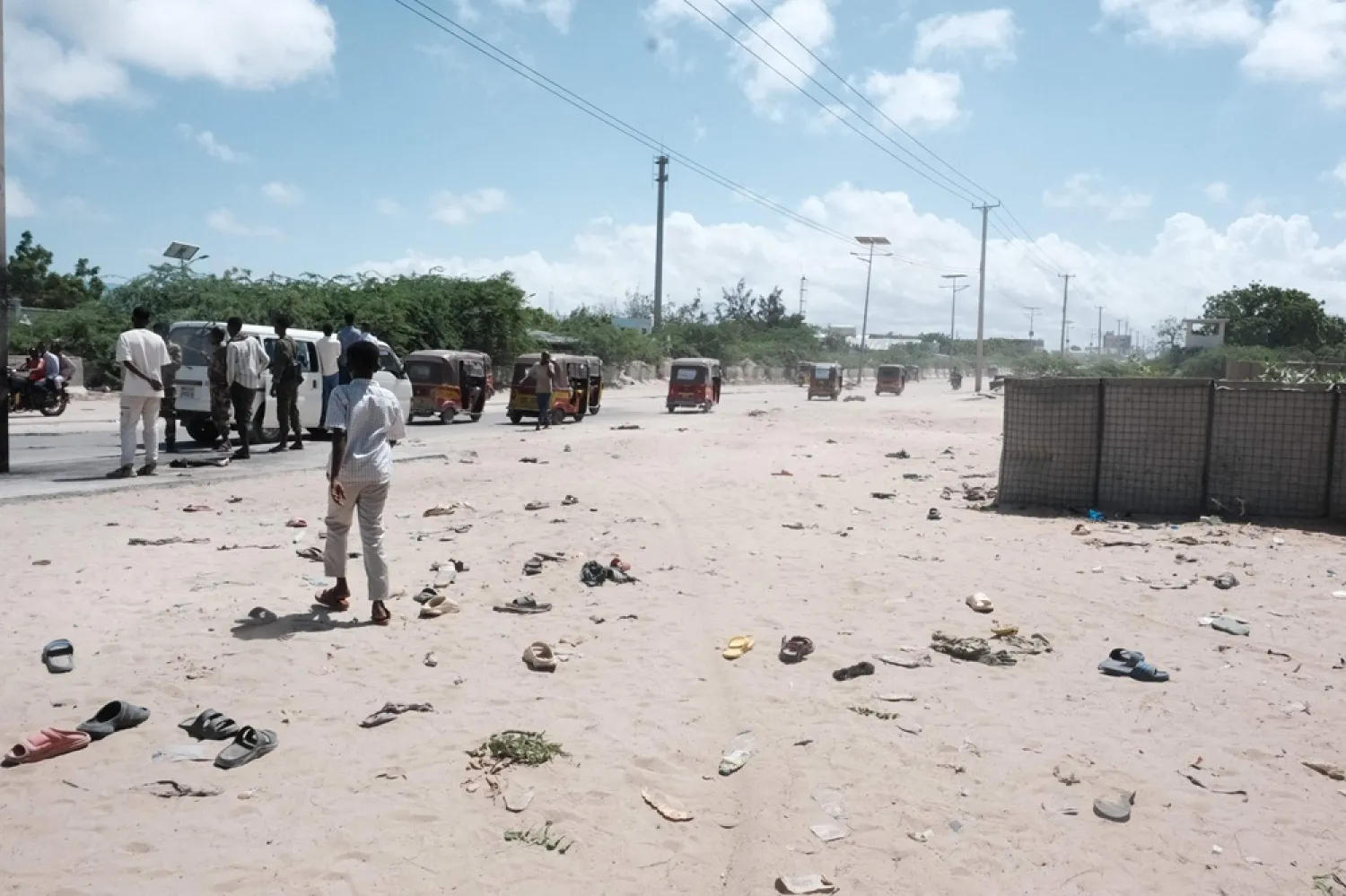 A general view of shoes scattered near the site of a suicide bombing in Mogadishu on May 18, 2025. (AFP) 