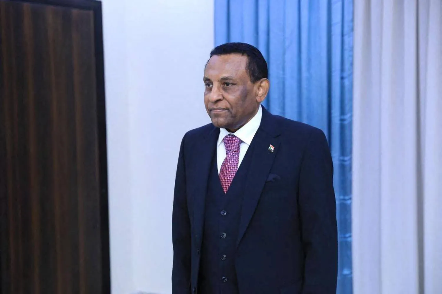 Former UN official Kamil Idris is sworn in, as Sudan's new prime minister in front of Sudan army chief, Abdel Fattah al-Burhan (not pictured) in Port Sudan, Sudan, May 31, 2025. Sudan Transitional Sovereignty Council/Handout via REUTERS  