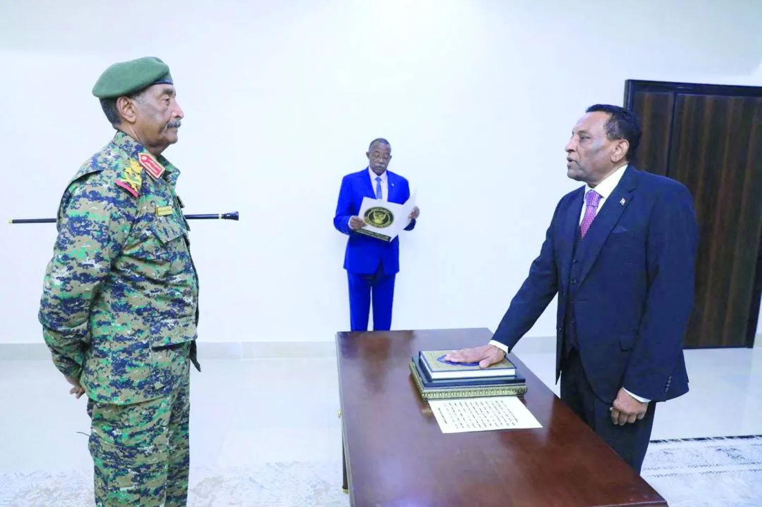 Sudan army chief, Abdel Fattah al-Burhan attends former UN official Kamil Idris swearing-in ceremony, as Sudan's new prime minister, in Port Sudan, Sudan, May 31, 2025. Sudan Transitional Sovereignty Council/Handout via REUTERS 