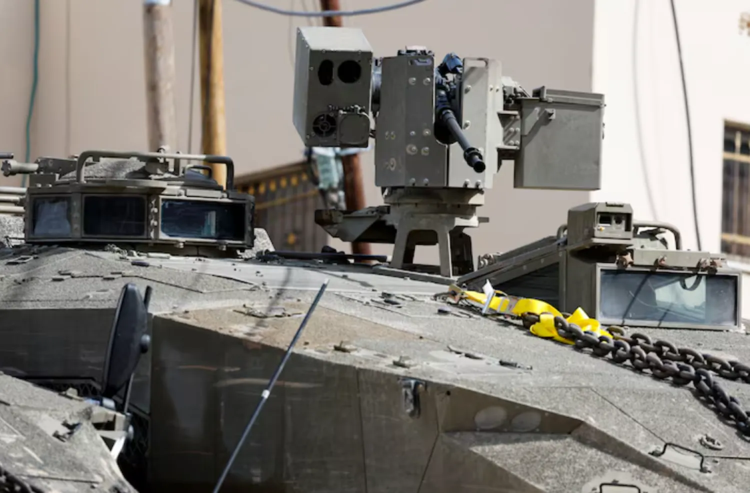 A remote controlled machine gun is attached to an Israeli military vehicle during an Israeli raid in Jenin, in the Israeli-occupied West Bank, March 4, 2025. REUTERS/Raneen Sawafta/File Photo 