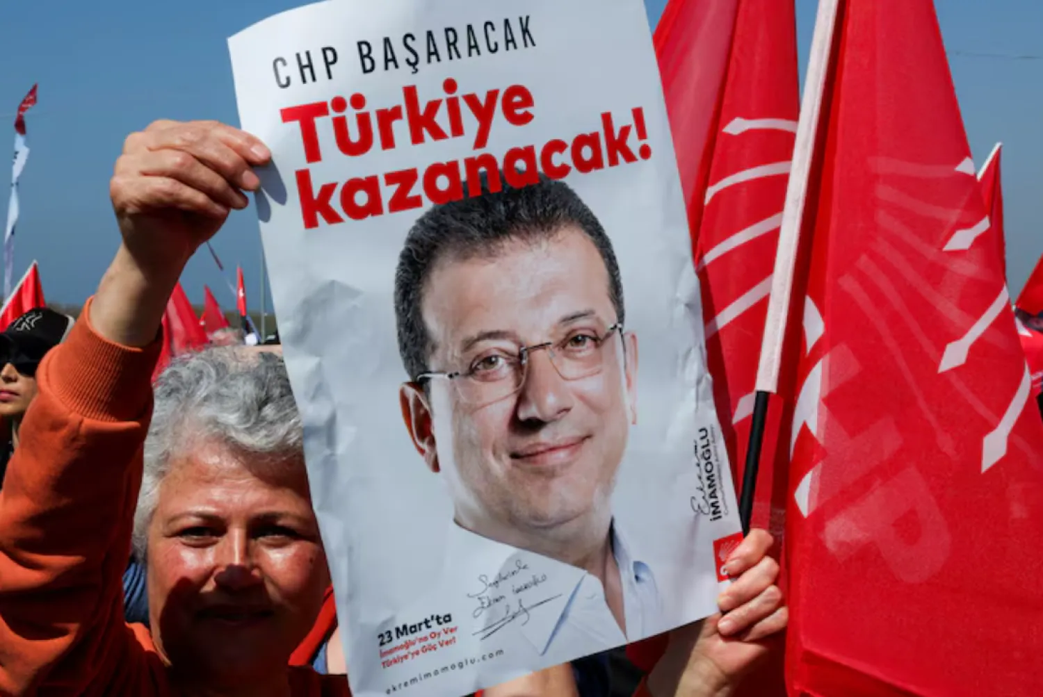 A person holds a placard during a rally to protest against the arrest of Istanbul Mayor Ekrem Imamoglu as part of a corruption investigation, in Istanbul, Turkey, March 29, 2025. REUTERS/Umit Bektas/File Photo 