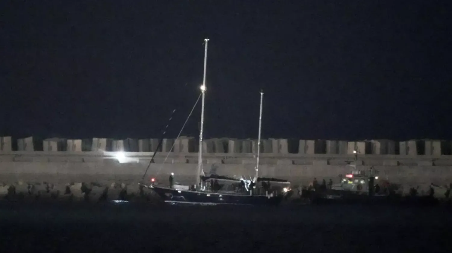 The Gaza-bound aid boat, Madleen, under escort of Israeli naval forces enters to Ashdod Port in southern Israel after being seized by Israeli forces on June 9, 2025. © Leo Correa, AP
