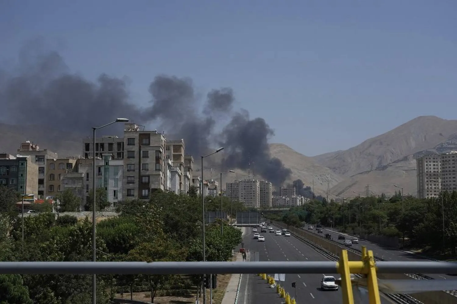 Smoke rises from an oil storage facility after it appeared to have been struck by an Israeli strike on Saturday, in Tehran, Iran, Monday, June 16, 2025. (AP)