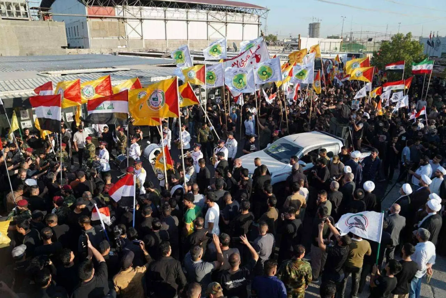 صورة وزعها «الحشد الشعبي» من تشييع أبو علي خليل وحيدر الموسوي في بغداد