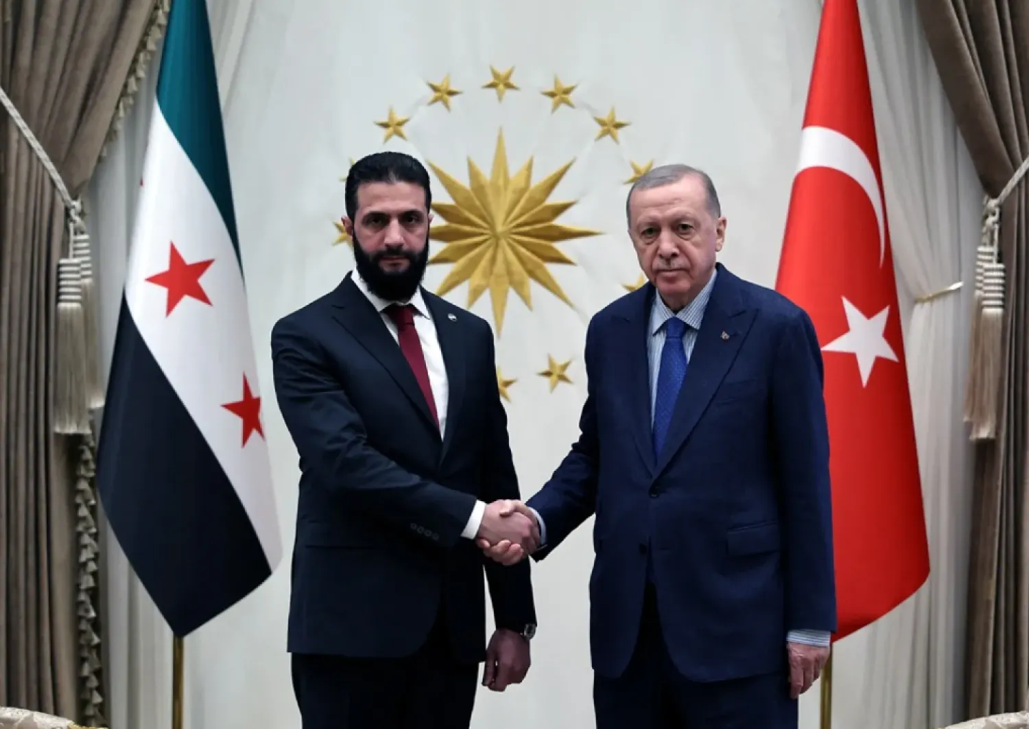 Syria's newly appointed president for a transitional phase Ahmed al-Sharaa meets with Türkiye's President Recep Tayyip Erdogan at the Presidential Palace in Ankara, Türkiye, February 4, 2025. (Murat Cetinmuhurdar/PPO/Handout via Reuters)
