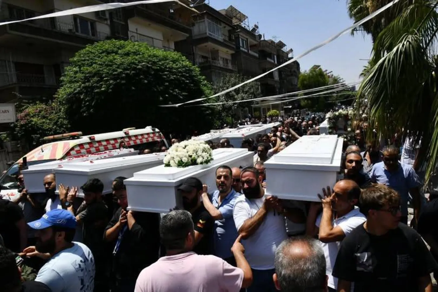 تشييع جماعي لضحايا تفجير «كنيسة مار إلياس» في حي القصاع (سانا)