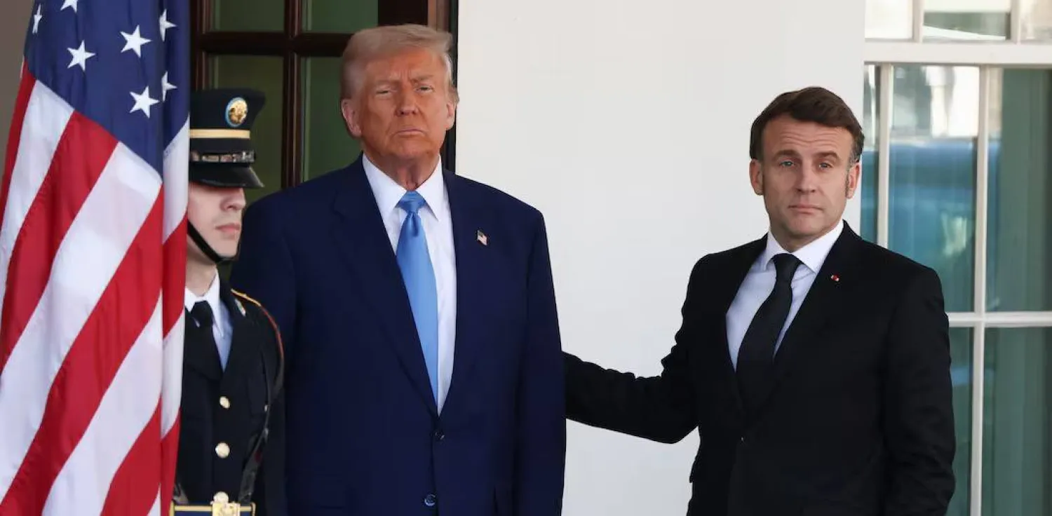 خلال لقاء سابق بين الرئيس الفرنسي إيمانويل ماكرون والرئيس الأميركي دونالد ترمب (رويترز)