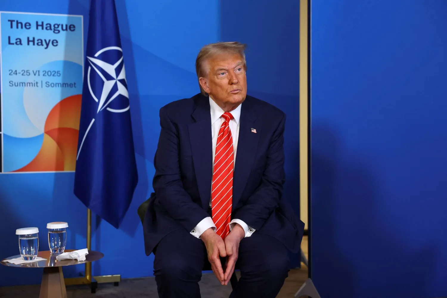 الرئيس الأميركي دونالد ترمب في لاهاي (رويترز)