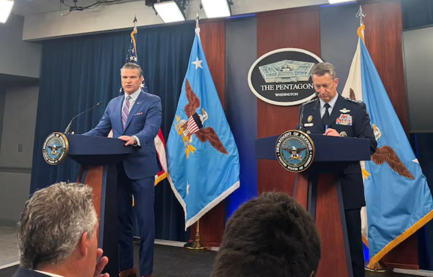 US Defense Secretary Pete Hegseth and Chairman of the Joint Chiefs of Staff Air Force General Dan Caine, speak during a press conference at the Pentagon in Arlington, Virginia, US, June 26, 2025. REUTERS/Idrees Ali 