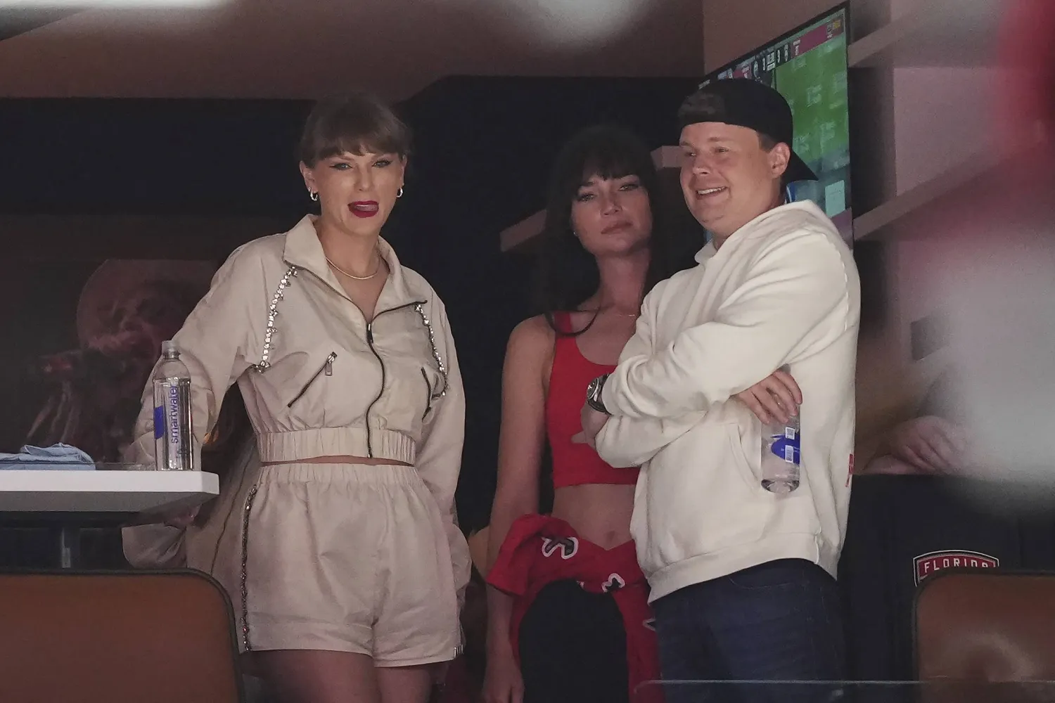 Singer Taylor Swift, left, takes in the third period in Game 4 of the NHL hockey Stanley Cup Final between the Edmonton Oilers and the Florida Panthers in Sunrise, Fla., Thursday, June 12, 2025. (Nathan Denette/The Canadian Press via AP)