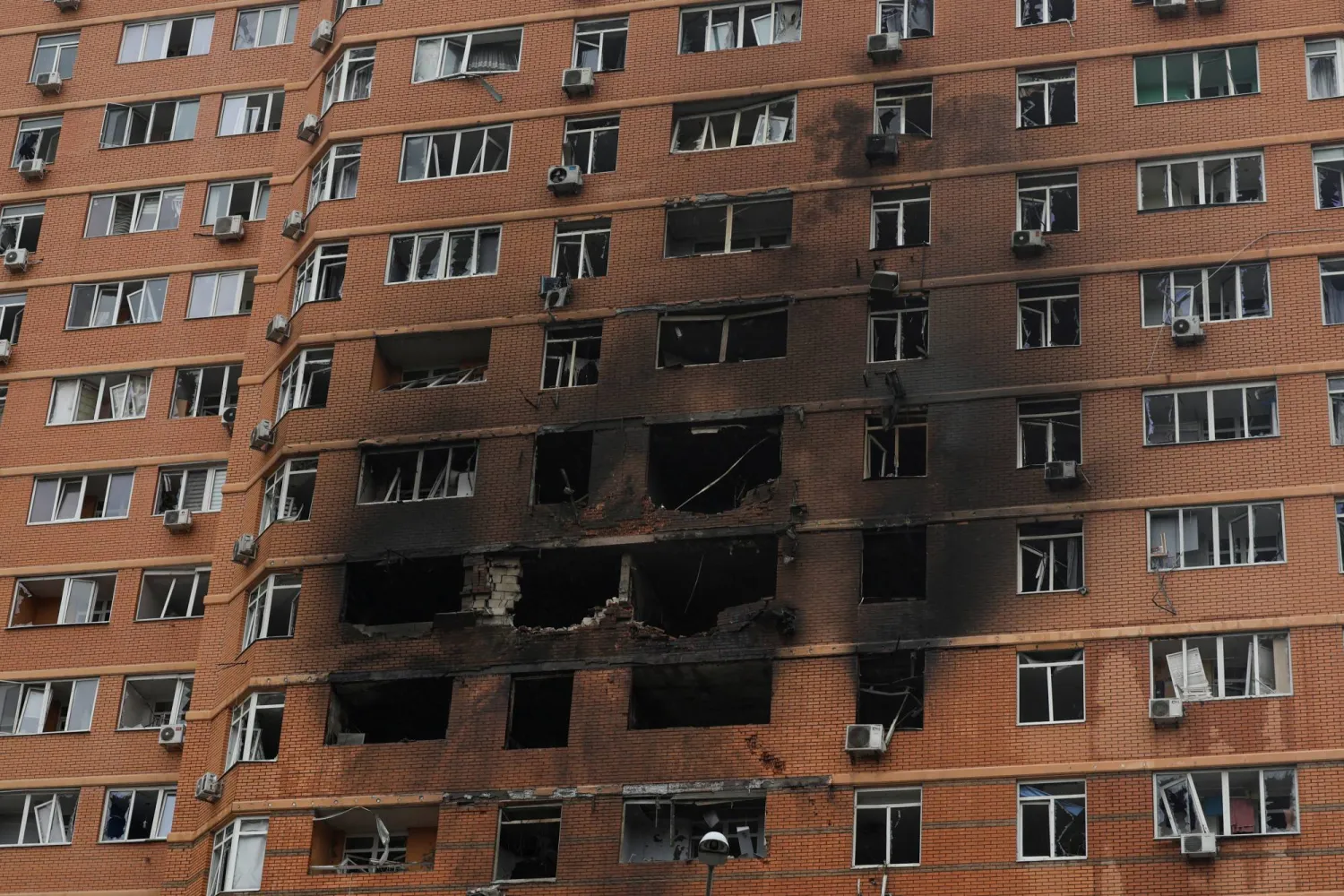 A view shows an apartment building hit by a Russian drone strike, amid Russia's attack on Ukraine, in Odesa, Ukraine June 28, 2025. REUTERS/Nina Liashonok