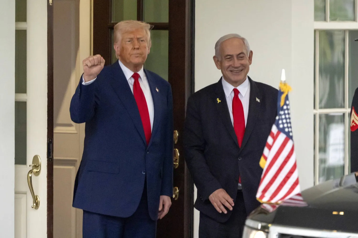 FILE - President Donald Trump, left, stands with Israel's Prime Minister Benjamin Netanyahu at the West Wing of the White House, April 7, 2025, in Washington. (AP Photo/Mark Schiefelbein, File)